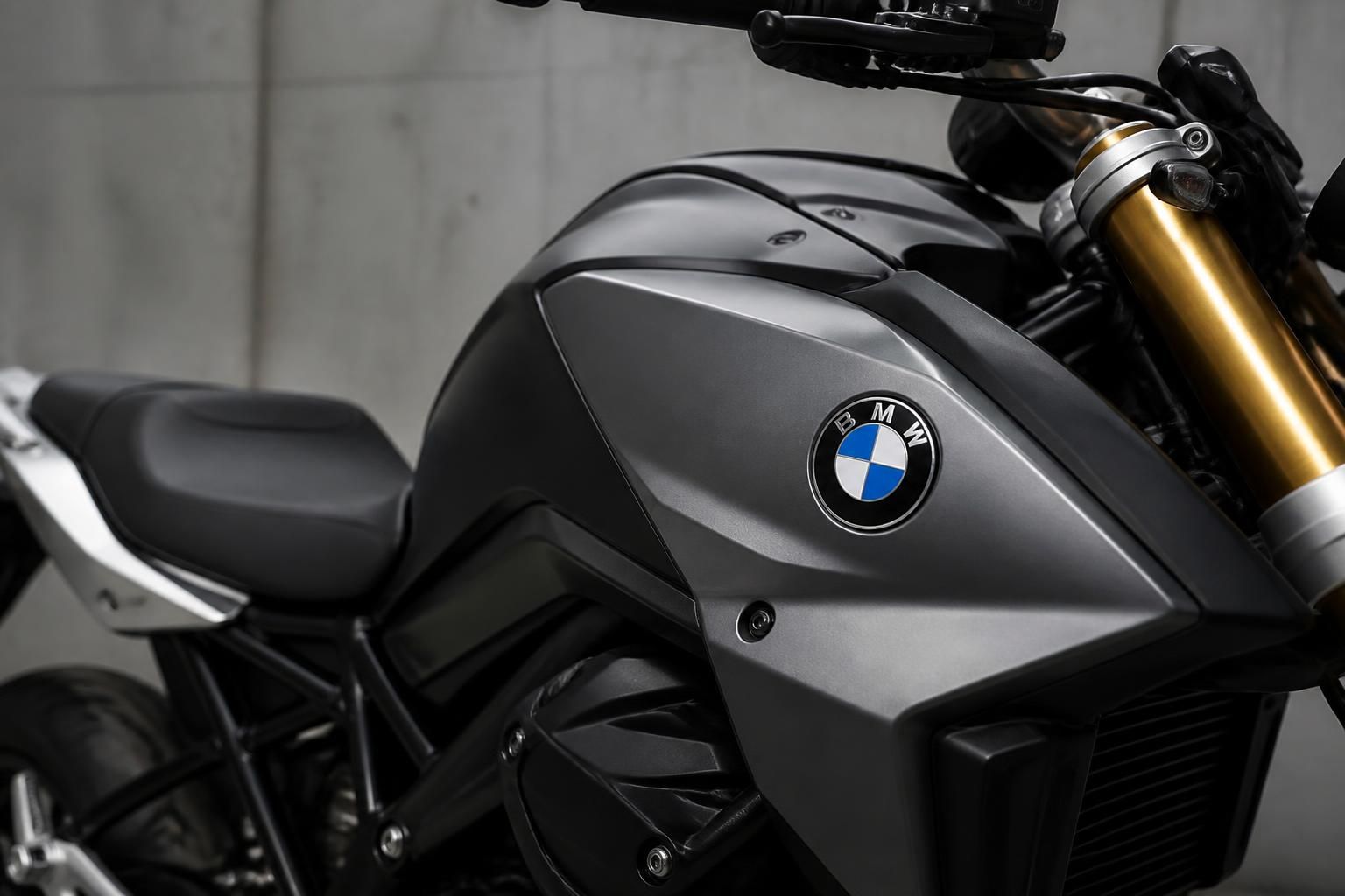 A premium BMW motorcycle in a clean professional setting.