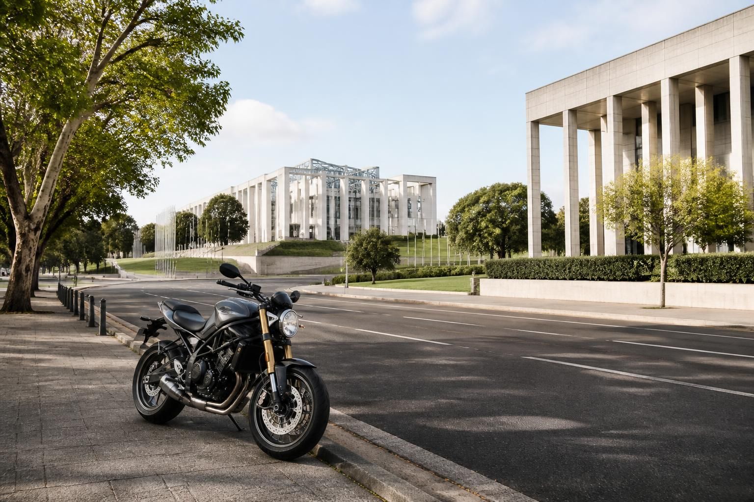 Canberra street with modern architecture and a parked motorcycle.