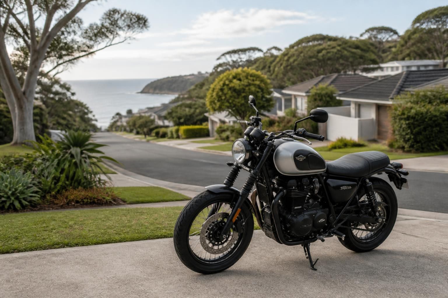 Central Coast streetscape with a parked motorcycle in a calm setting.